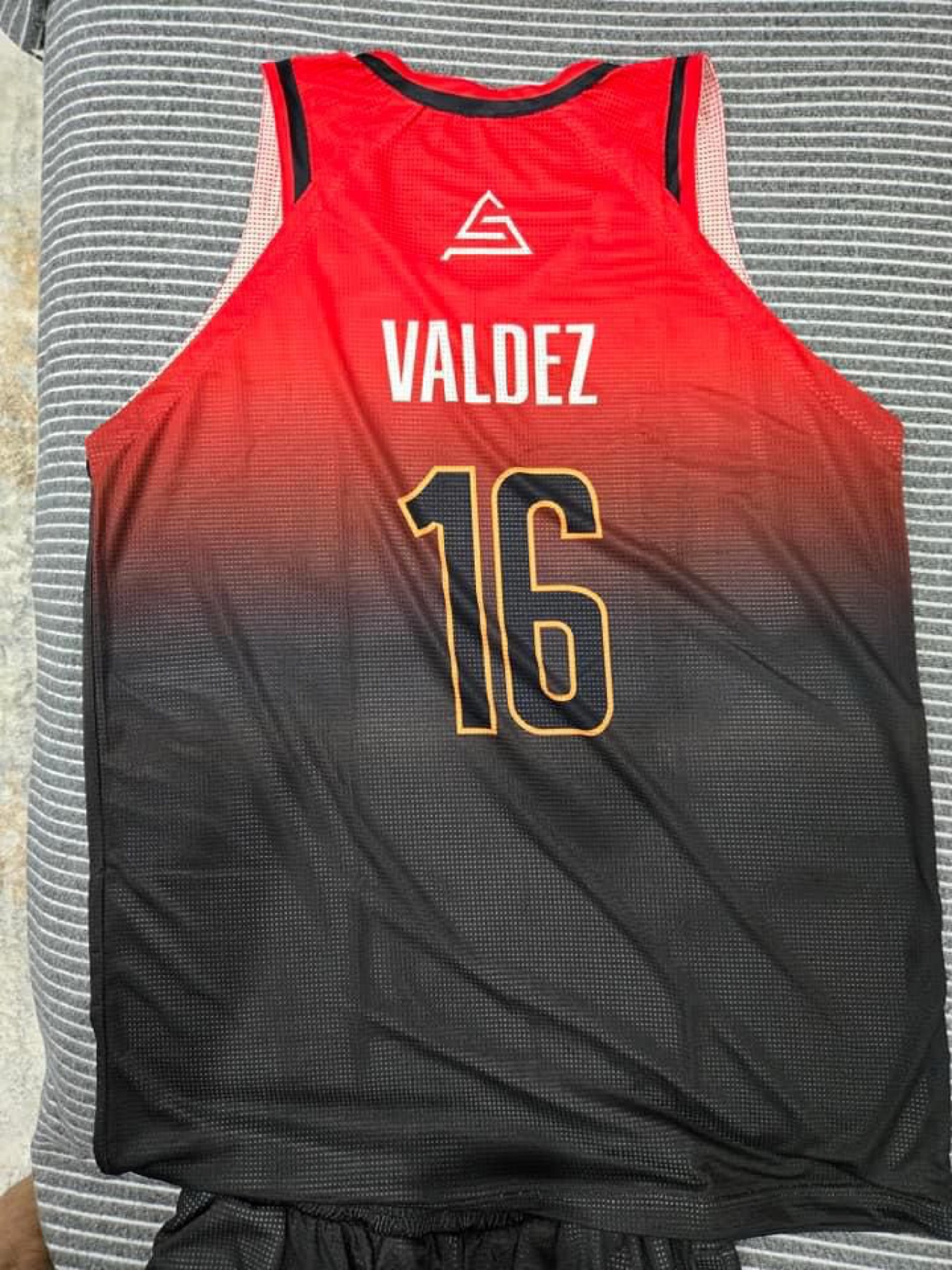 Team wearing gradient custom uniforms